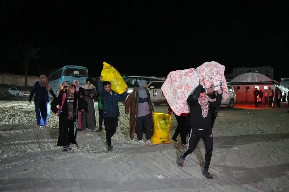 Palestinians attempt to cross between Gaza and Egypt at the Rafah border crossing